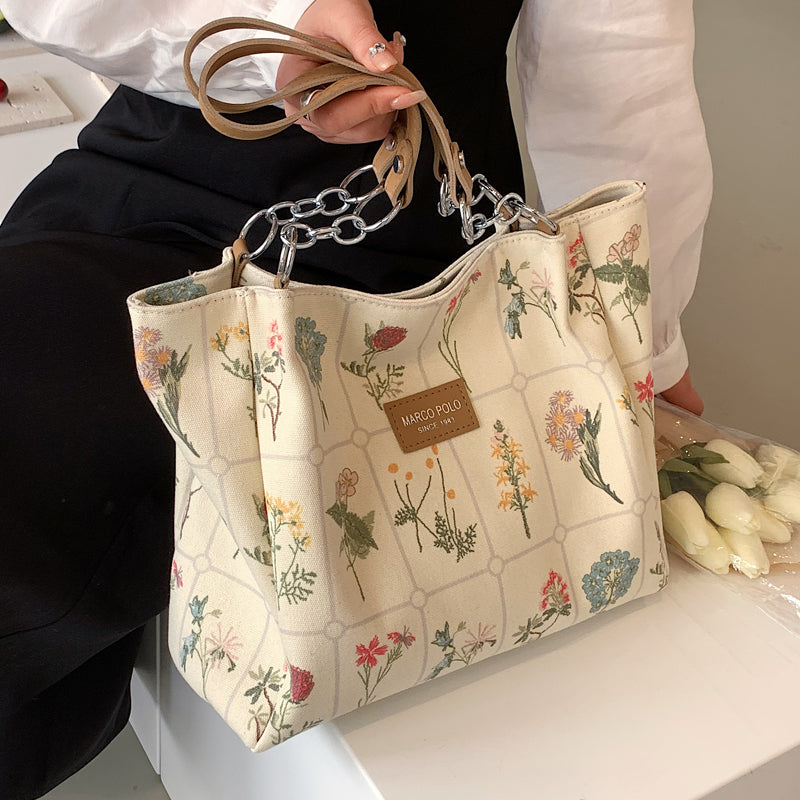 Floral Handbag, enough room for books, phone, wallet, etc!